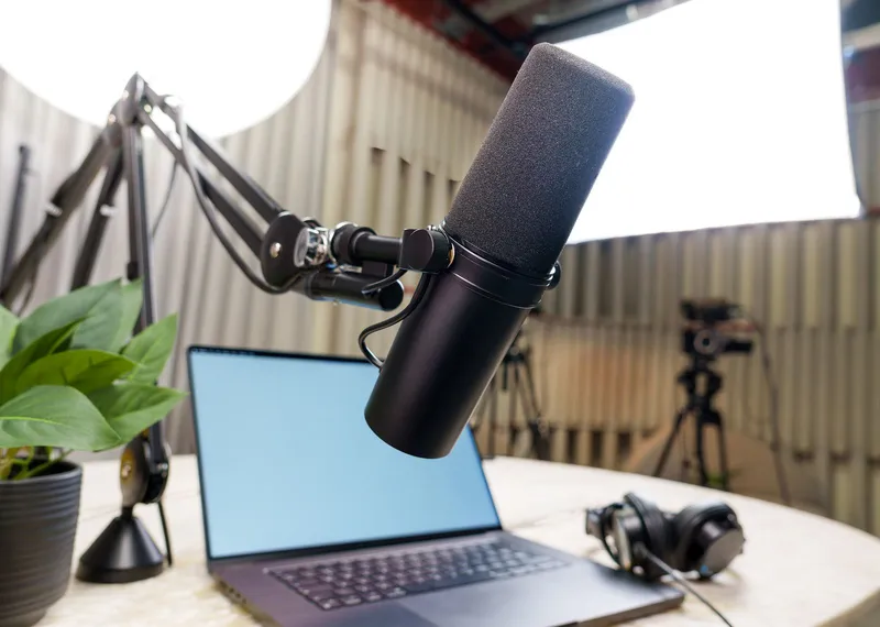 Podcast studio with microphone and recording equipment